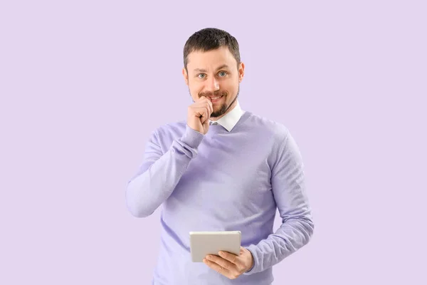 Handsome Man Tablet Computer Biting Nails Lilac Background — Foto Stock