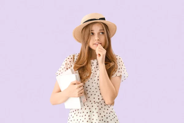 Young Woman Books Biting Nails Lilac Background — Stockfoto