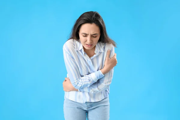 Young Woman Appendicitis Blue Background — Stock Photo, Image