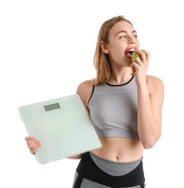 Αθλητική Νεαρή Γυναίκα Λέπια Τρώει Μήλο Λευκό Φόντο — Φωτογραφία Αρχείου
