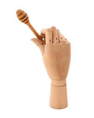 Beyaz arka planda ballı tahta el.