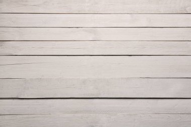 Arka plan olarak beyaz yıpranmış ahşap dokunun görünümü