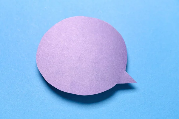 stock image Blank paper speech bubble on blue background