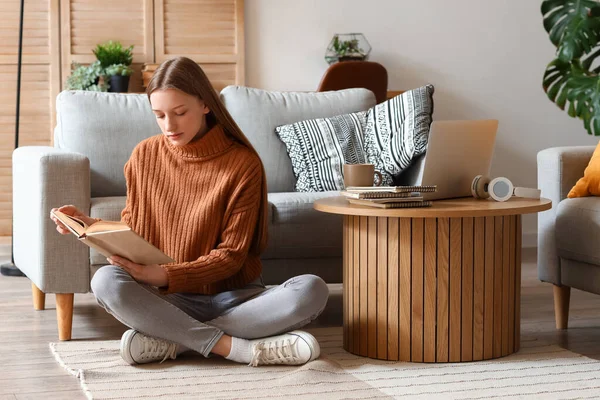 Female Student Reading Book Home — Stock Photo, Image