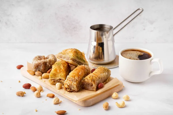 Wooden Board Tasty Baklava Cup Coffee Light Background — Stock Photo, Image
