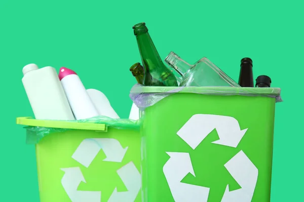 Trash Bins Different Garbage Green Background Closeup — Stock Photo, Image