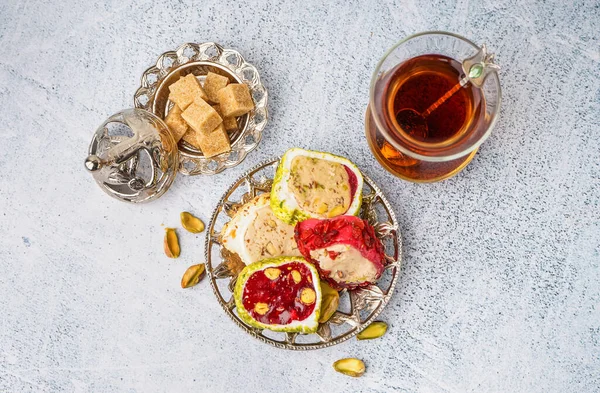 Plate Tasty Turkish Delight Glass Tea Light Background — Stock Photo, Image