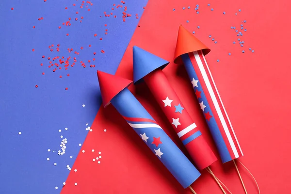 stock image Firework rockets and confetti for Independence Day on colorful background