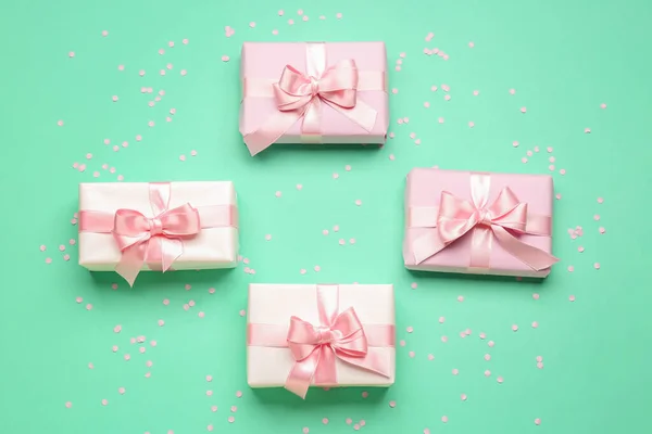 Gift Boxes Beautiful Bows Confetti Turquoise Background — Stock Photo, Image