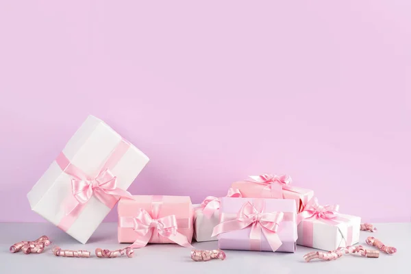 Gift Boxes Bows Serpentine Pink Background — Stock Photo, Image