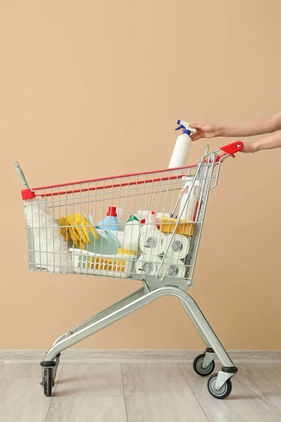 Shopping Cart Cleaning Supplies Beige Wall — Stock Photo, Image