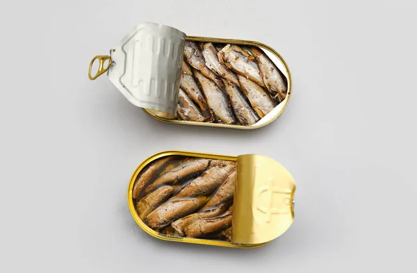 Opened Tin Cans Sprats Oil Grey Background — Stock Photo, Image