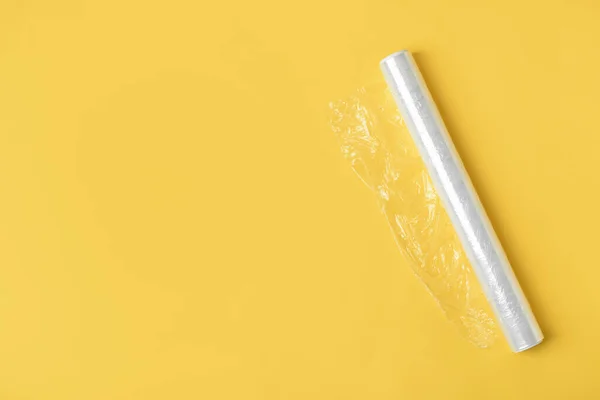 Roll Stretch Wrap Yellow Background — Stock Photo, Image