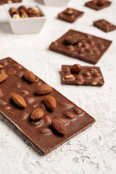 Sweet Tasty Chocolate Nuts Light Background — Stock Photo, Image