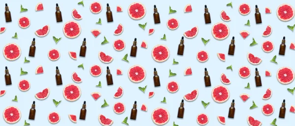Many Bottles Grapefruit Essential Oil Light Background Pattern Design — Stock Fotó