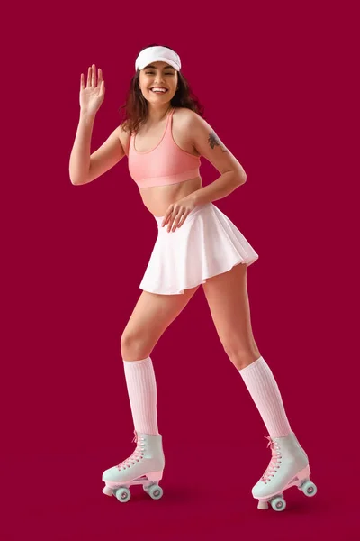 Young Woman Roller Skates Pink Background — Zdjęcie stockowe