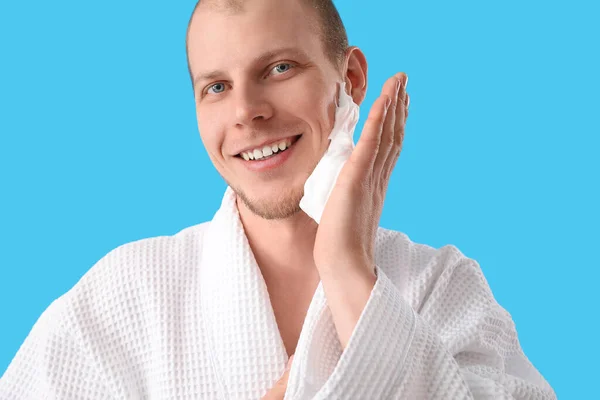 Young Man Shaving Foam Light Blue Background — Stock Photo, Image
