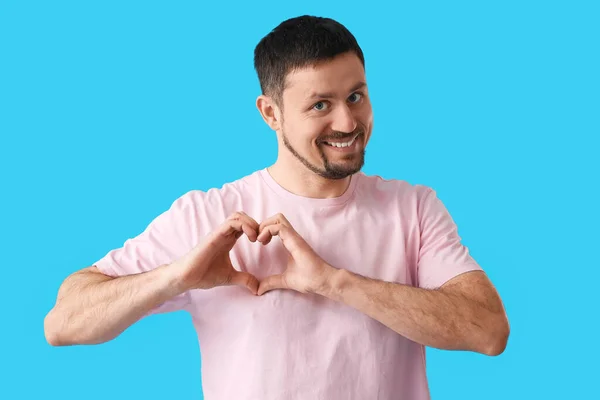 Handsome Man Shirt Making Heart Shape Hands Blue Background — Stock Photo, Image