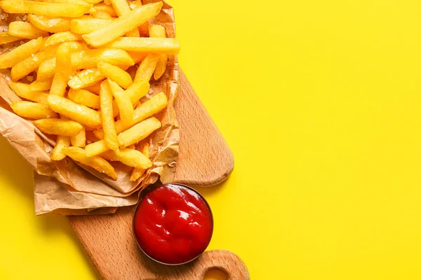 Wooden Board Tasty French Fries Ketchup Yellow Background — Stock Photo, Image