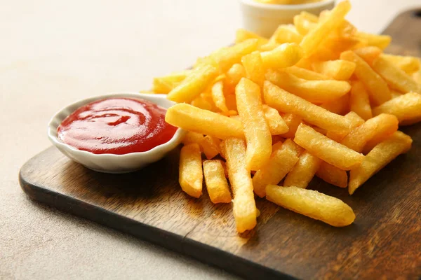 Wooden Board Tasty French Fries Ketchup Light Background Closeup — Stock Photo, Image
