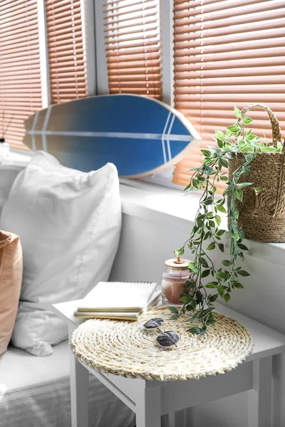 stock image Houseplant and surfboard on windowsill in bedroom