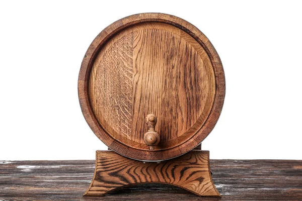 stock image Wooden barrel on table against white background