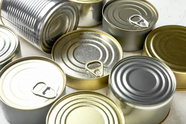 Assortment Tin Cans Fish White Table Closeup — Stock Photo, Image
