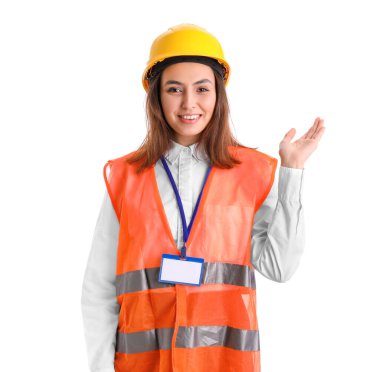 Female worker in vest and hardhat on white background