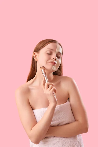 Young Woman Applied Turmeric Mask Brush Pink Background — Stock Photo, Image