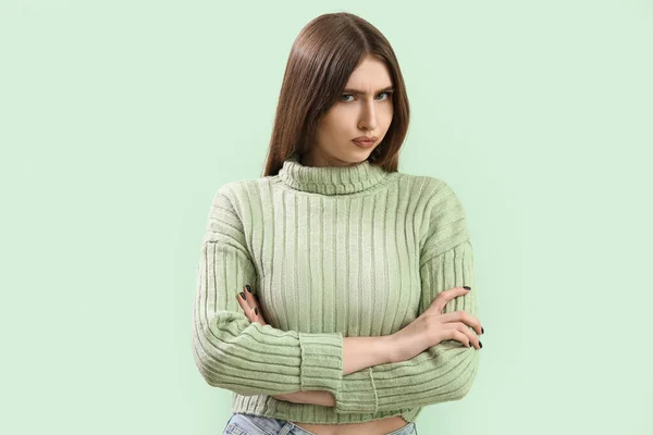 Displeased Young Woman Warm Knitted Sweater Mint Background — Stock Photo, Image