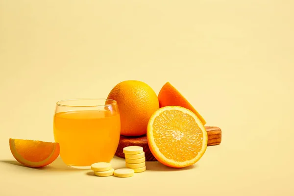 Board Glass Vitamin Effervescent Tablet Dissolved Water Oranges Beige Background — Stock Photo, Image