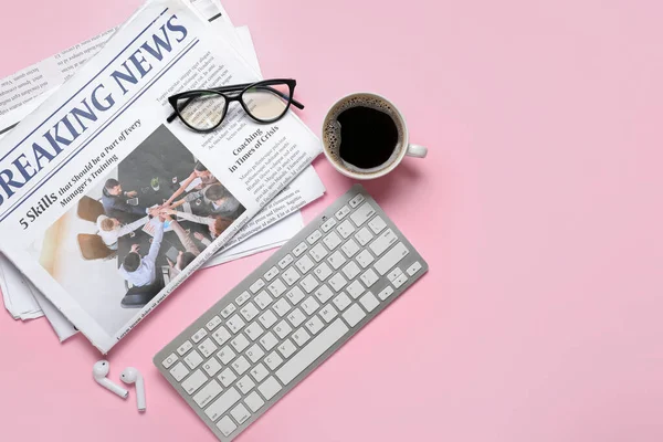 Newspapers Eyeglasses Cup Coffee Earphones Computer Keyboard Pink Background — Stock Photo, Image