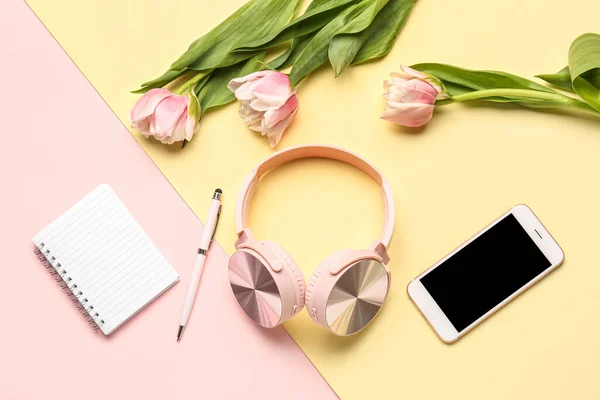 Modern Headphones Mobile Phone Notebook Tulip Flowers Color Background — Stock Photo, Image