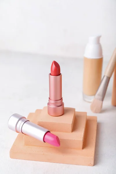 Decorative Plaster Podiums Lipsticks Light Background — Stock Photo, Image