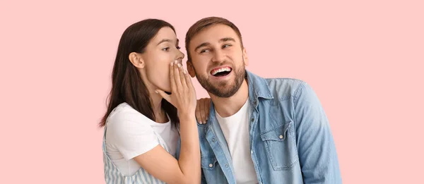 Young Woman Telling Secret Her Boyfriend Pink Background — Stock Photo, Image