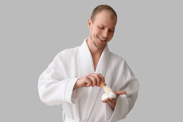 Young Man Shaving Foam Brush Light Background — Stock Photo, Image