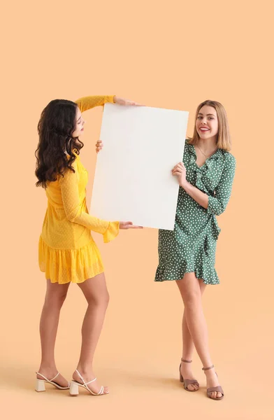 Young Women Dresses Big Blank Poster Beige Background — Stock Photo, Image