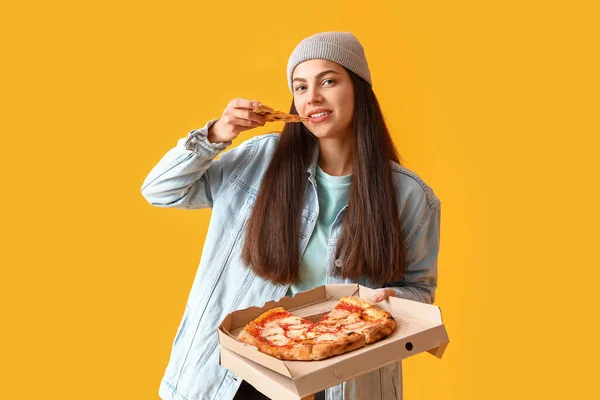 Young Woman Tasty Pizza Yellow Background — Stock Photo, Image