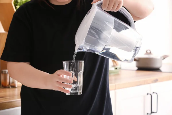 Woman Pouring Water Modern Filter Jug Glass — Stock Photo, Image