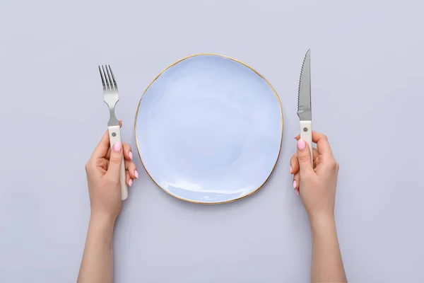 Woman Cutlery Empty Plate Grey Background — Stock Photo, Image