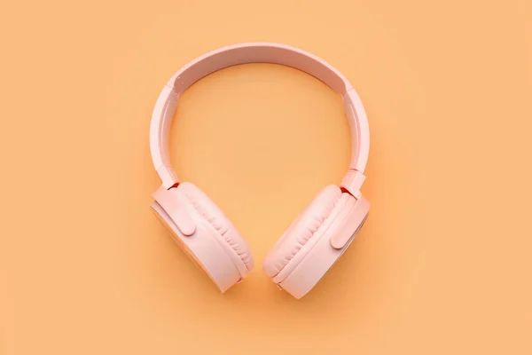 Modern Pink Headphones Beige Background — Stock Photo, Image