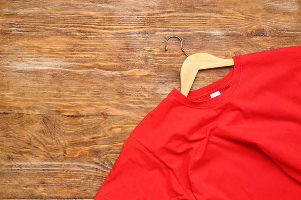 Stylish Red Shirt Hanger Wooden Background — Stock Photo, Image