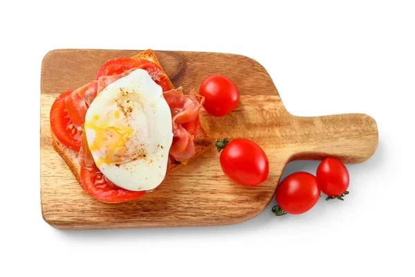 stock image Wooden board with tasty eggs Benedict isolated on white background