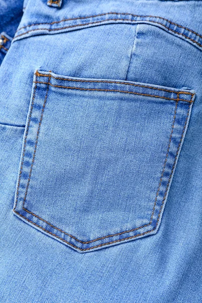 蓝色牛仔裤为背景 — 图库照片