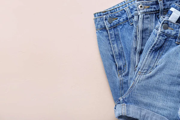 Stylish Denim Shorts Beige Background Closeup — Stock Photo, Image