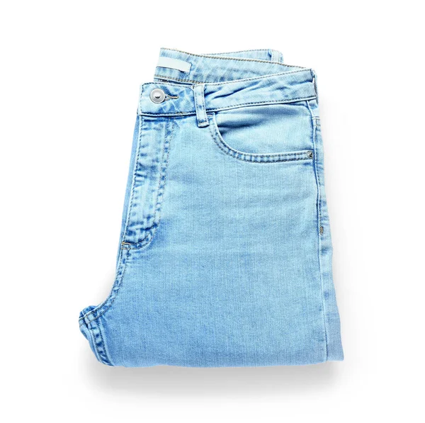 Calça Jeans Dobrada Sobre Fundo Branco — Fotografia de Stock