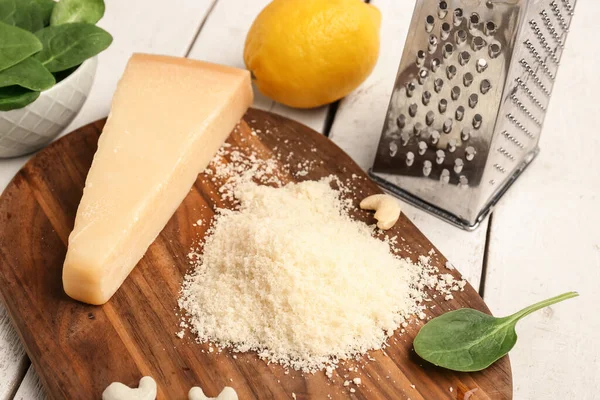 Board Tasty Parmesan Cheese Light Wooden Background Closeup — Stock Photo, Image