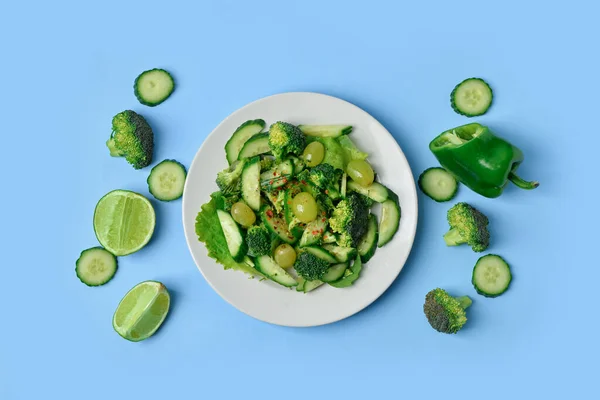 Plate Fresh Salad Ingredients Blue Background — Stock Photo, Image