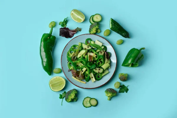 Plate Fresh Salad Ingredients Turquoise Background — Stock Photo, Image
