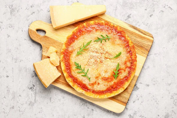 Wooden Board Tasty Pizza Parmesan Cheese Grey Grunge Background — Stock Photo, Image